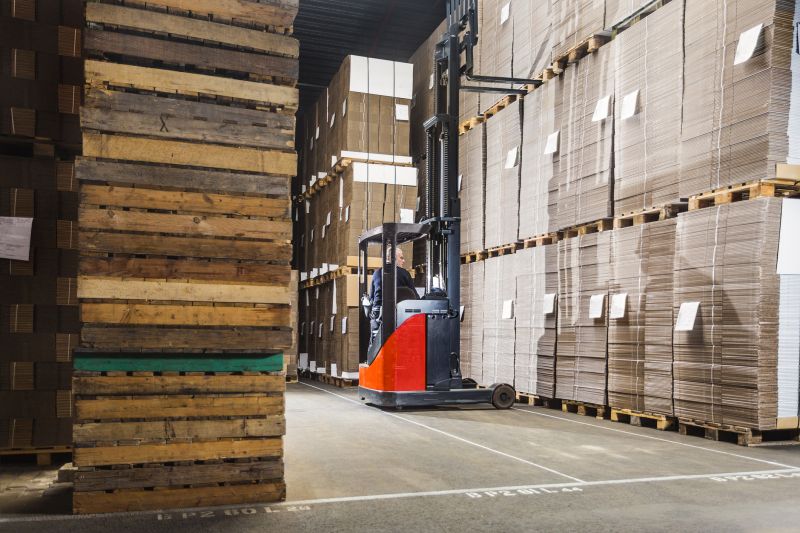 Reach trucks maximize vertical storage space.